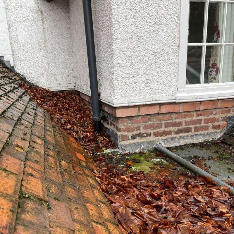 Gutter Cleaning Before Picture, A private home in Knutsford Cheshire, Flat Rooftop highlighting what Pristine Cleans Professional Gutter Clearing Services can do for your Cheshire Property