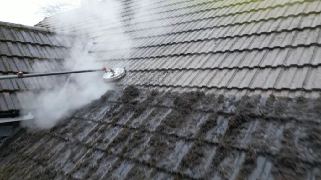 Up close of the soft washing technique used to clean moss from roofs in and around Cheshire by Pristine Clean.