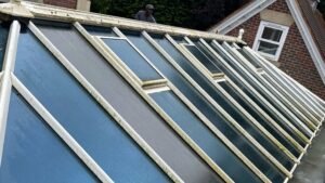 Green and mossed conservatory roof on a Cheshire property before professional cleaning